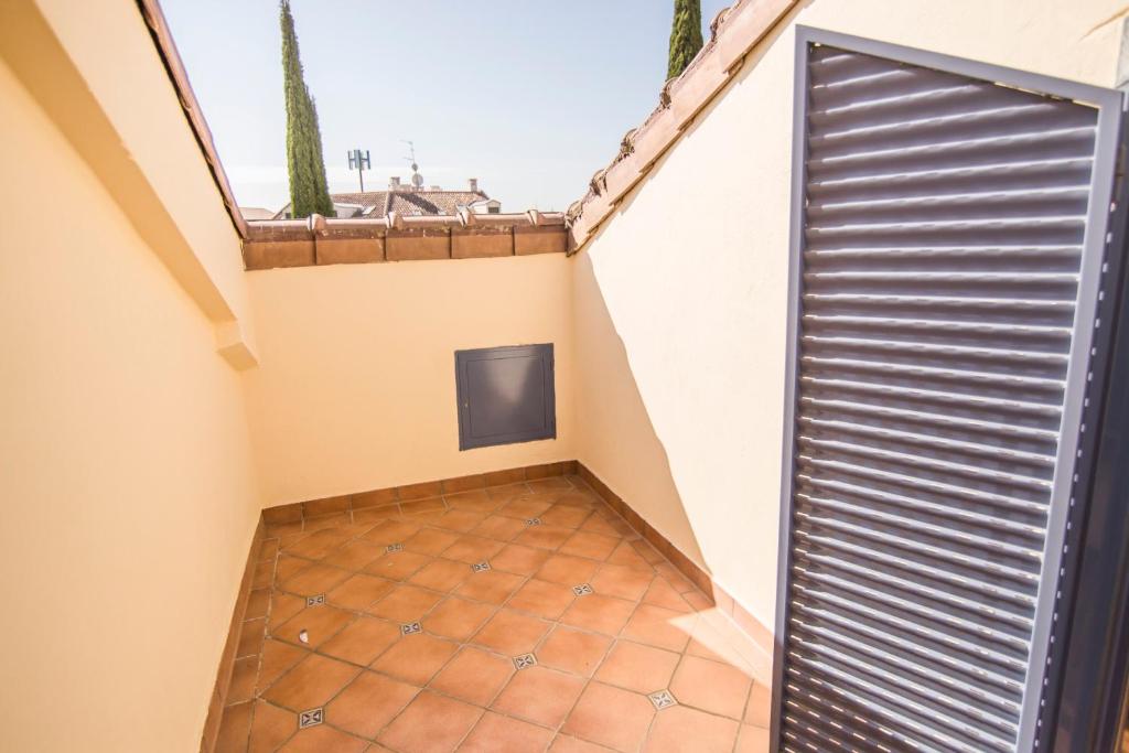 Apartamentos Plaza de Santiago - Estudios Turisticos - 1 LLAVE - Estudio De Un ático De Una Cama Con Terraza