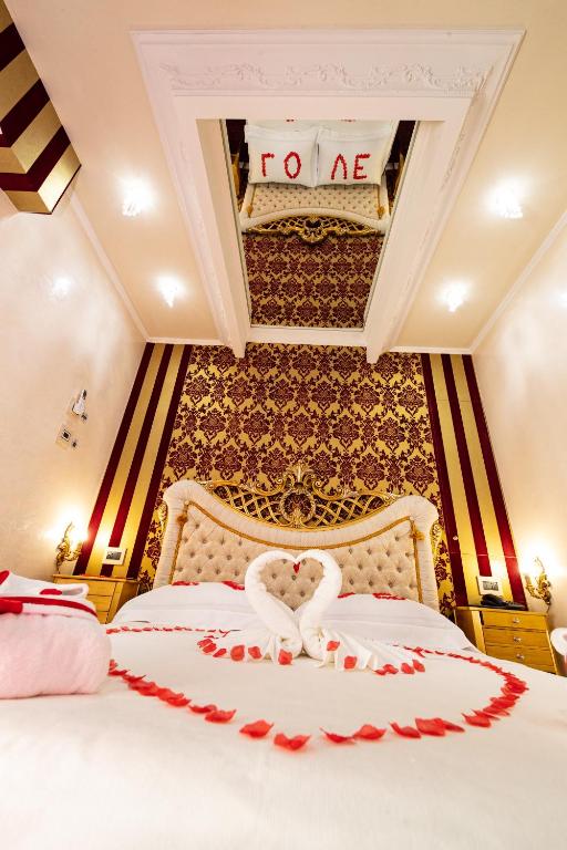Posteľ alebo postele v izbe v ubytovaní Erossuite GuestHouse