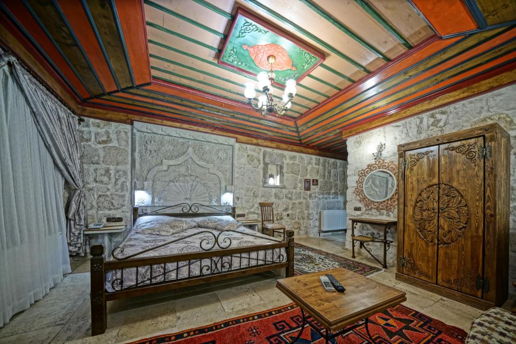 Postel nebo postele na pokoji v ubytování Alaturca House