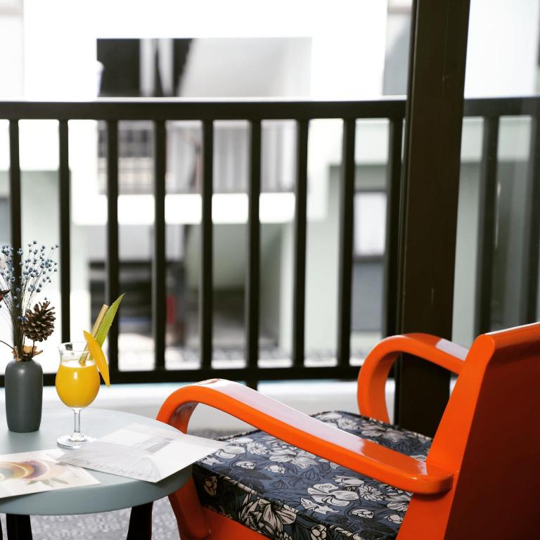 Posezení v ubytování De An Hotel