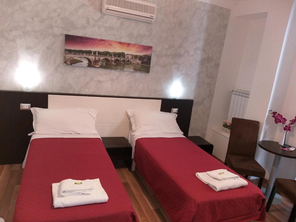 Posteľ alebo postele v izbe v ubytovaní B&B A Home in Rome