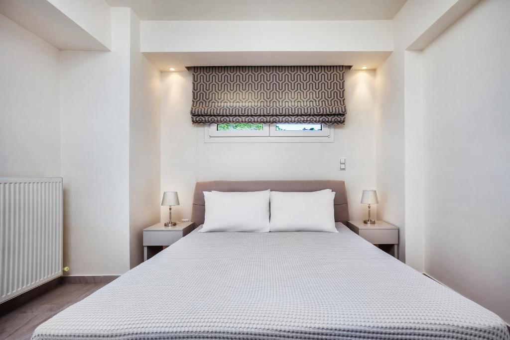 Posteľ alebo postele v izbe v ubytovaní Deluxe Villas Mira Mare