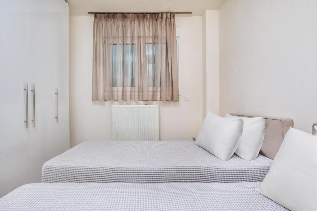 Posteľ alebo postele v izbe v ubytovaní Deluxe Villas Mira Mare