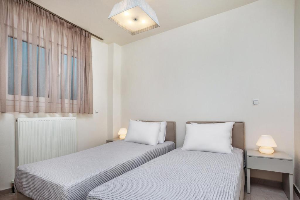 Posteľ alebo postele v izbe v ubytovaní Deluxe Villas Mira Mare