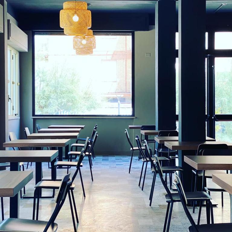 A restaurant or other place to eat at Hotel Rex