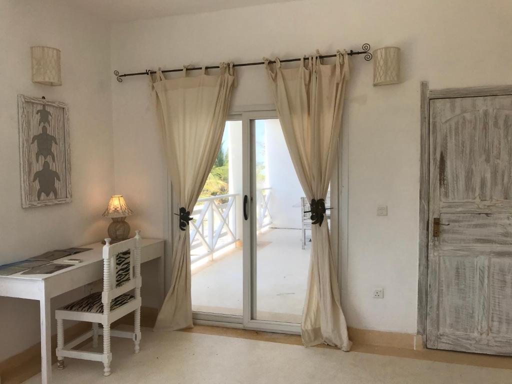 Postel nebo postele na pokoji v ubytování Life Resort St. Thomas Royal Palm
