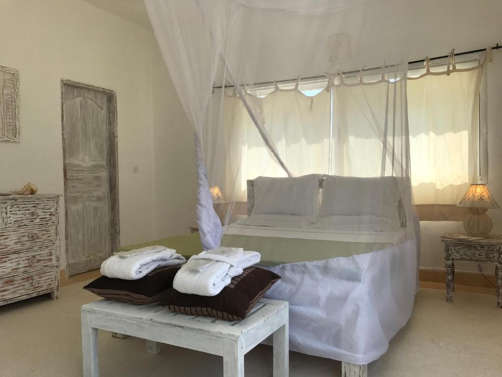 Postel nebo postele na pokoji v ubytování Life Resort St. Thomas Royal Palm