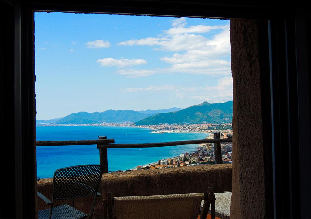 a view of the ocean from a balcony at Blu Oltremare in Borgio Verezzi