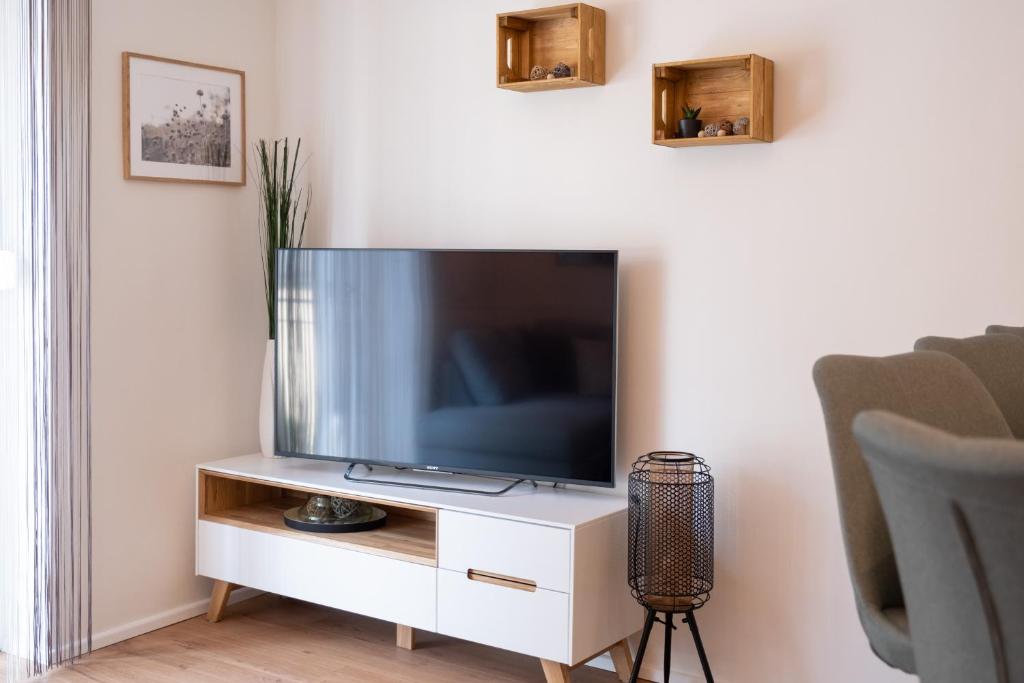 Televízia a/alebo spoločenská miestnosť v ubytovaní MH Living - 5 - Scandinavian Living Dream in Center