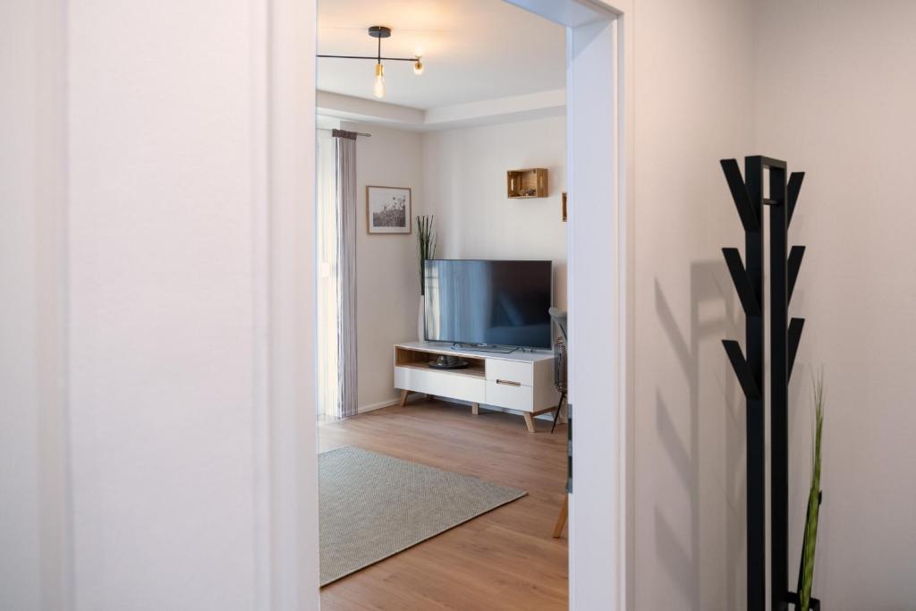 Televízia a/alebo spoločenská miestnosť v ubytovaní MH Living - 5 - Scandinavian Living Dream in Center