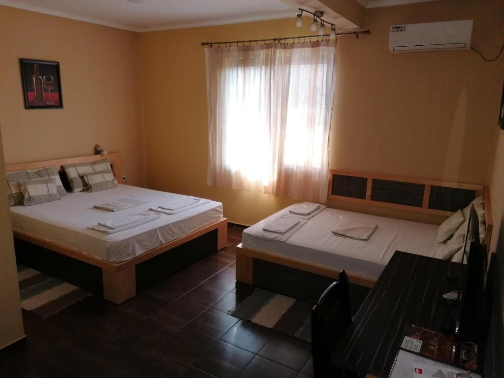 Postel nebo postele na pokoji v ubytování Villa Gurman 024