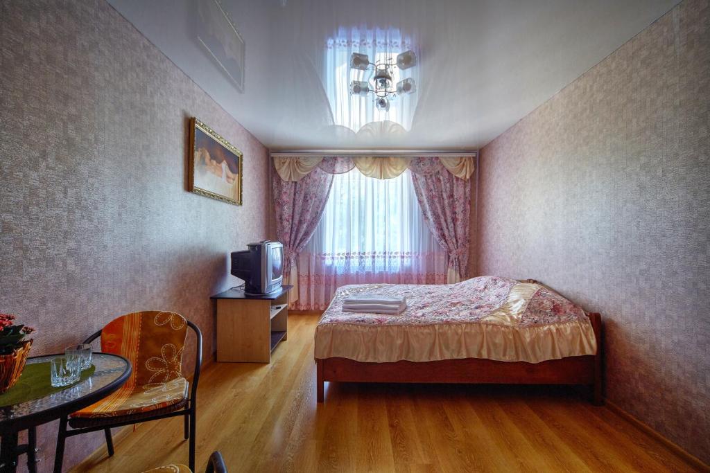 Postel nebo postele na pokoji v ubytování Domashniy