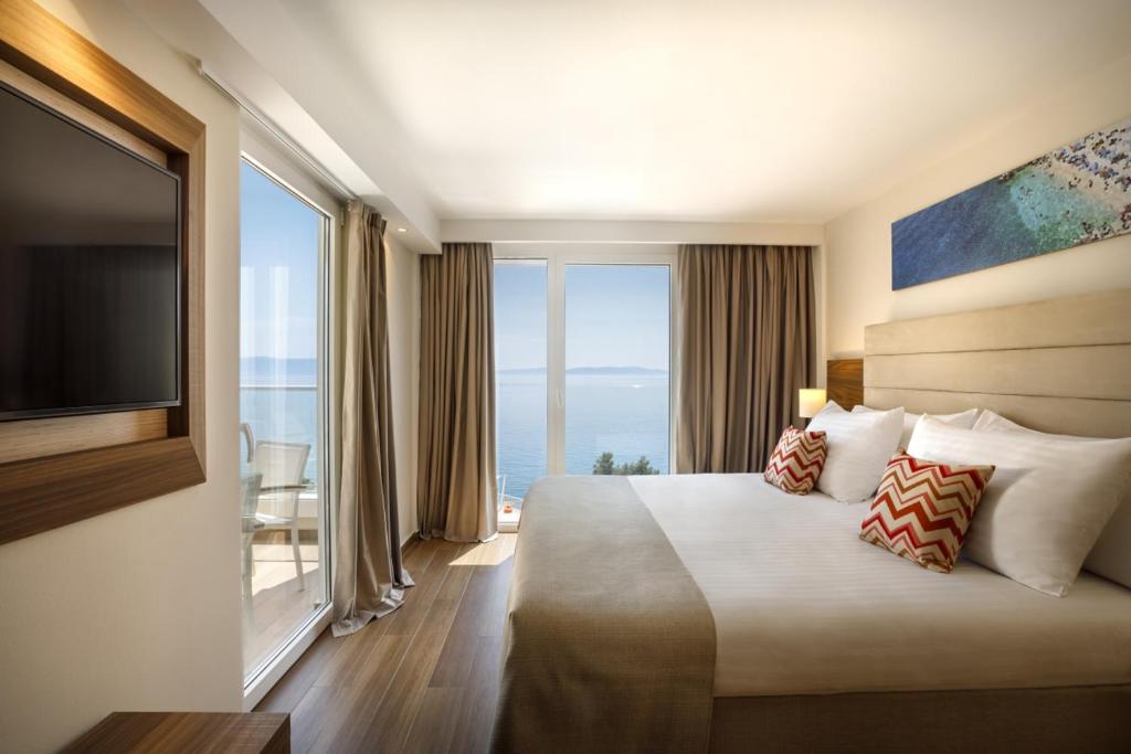 Postel nebo postele na pokoji v ubytování Girandella Resort, Valamar Collection