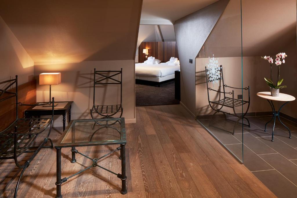 Postel nebo postele na pokoji v ubytování Hotel L'Europe