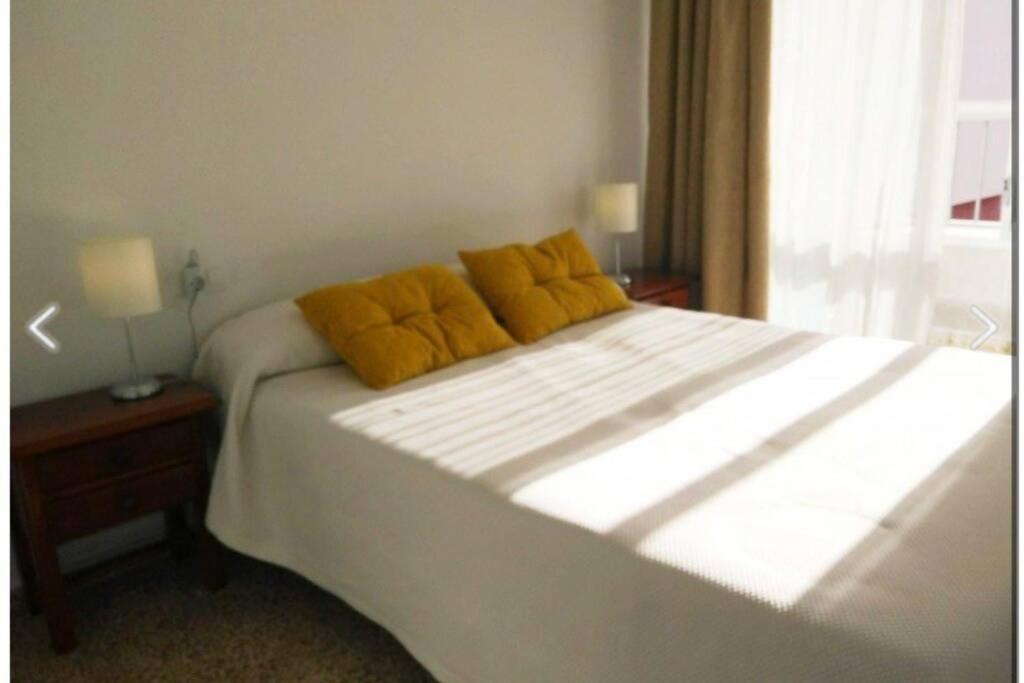 Posteľ alebo postele v izbe v ubytovaní NEPTUNO 3 CENTRO DE NERJA