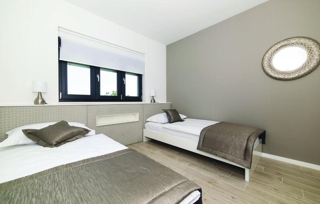 Posteľ alebo postele v izbe v ubytovaní Luxury Dream House