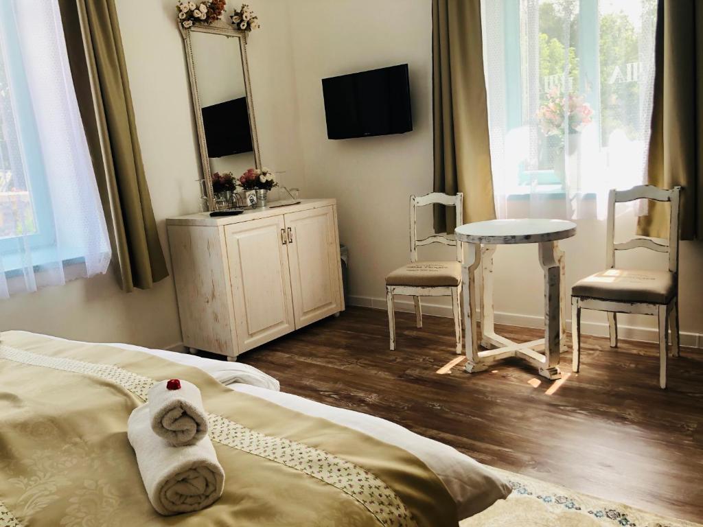 A television and/or entertainment centre at Villa Bella