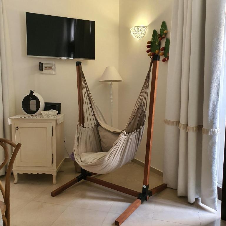 TV a/nebo společenská místnost v ubytování White Suite Polignano 08