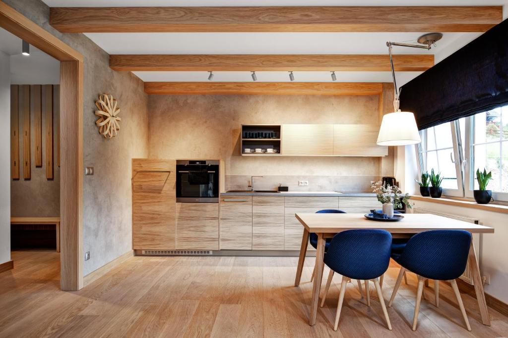 Kuchyň nebo kuchyňský kout v ubytování VRÁTNA Apartmány Stoh A1 a C1
