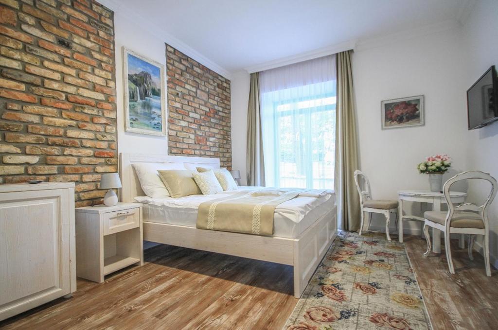A bed or beds in a room at Villa Bella