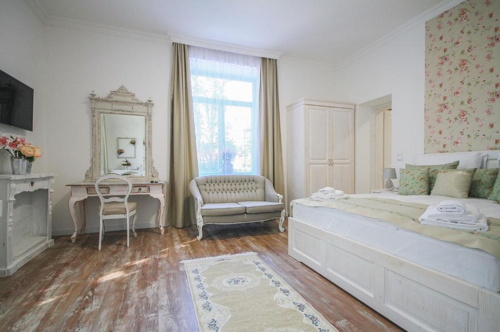 A bed or beds in a room at Villa Bella