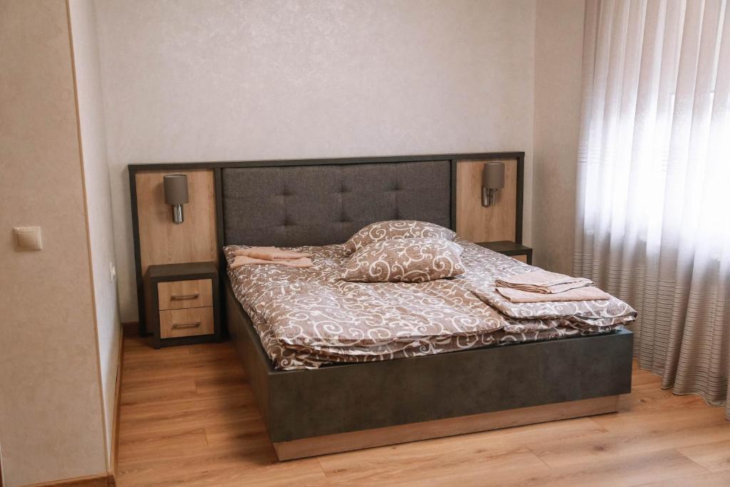 Postel nebo postele na pokoji v ubytování HOTEL Баймонт