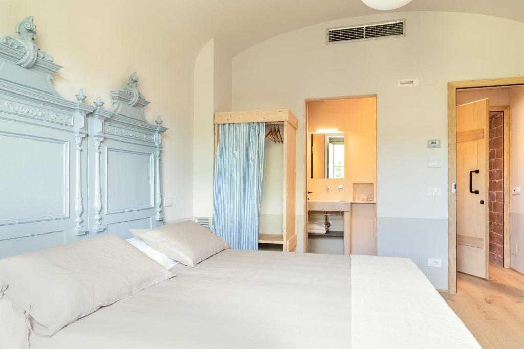 Postel nebo postele na pokoji v ubytování CUGUSI BnB