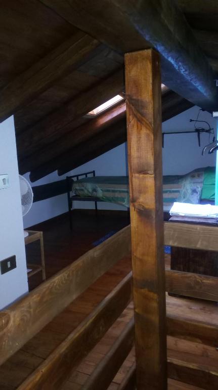 Palanda nebo palandy na pokoji v ubytování La corte del pane