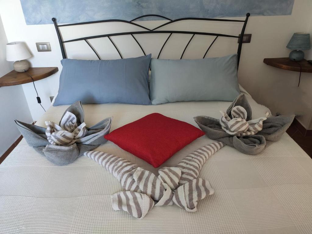 Postel nebo postele na pokoji v ubytování Pietra Di Mare