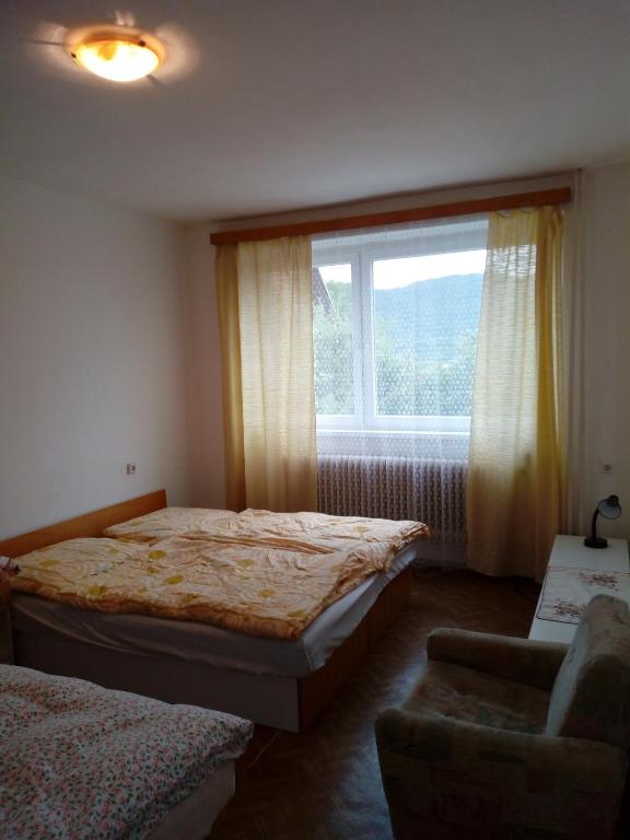Postel nebo postele na pokoji v ubytování Ubytovanie u Tomku