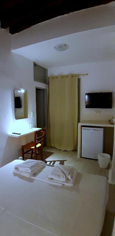 Postel nebo postele na pokoji v ubytování Castellino Naxos