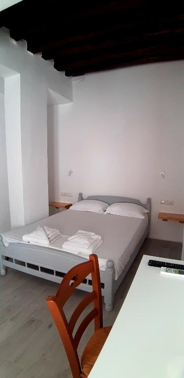 Postel nebo postele na pokoji v ubytování Castellino Naxos