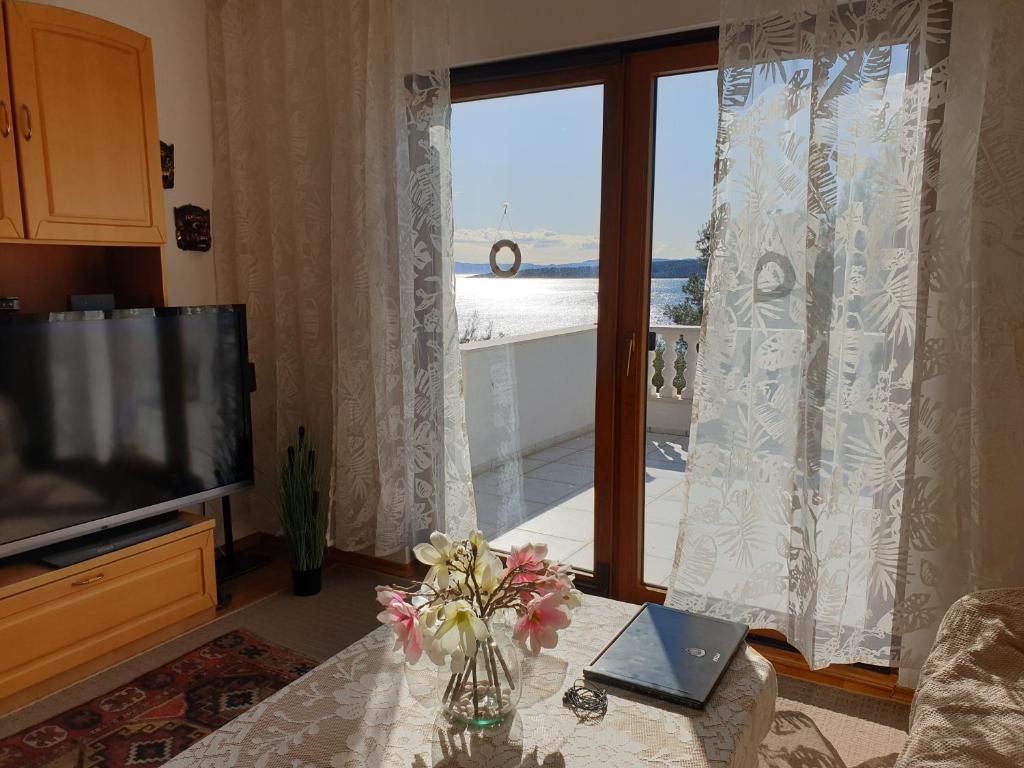 TV a/nebo společenská místnost v ubytování Corinna Zavala Resort