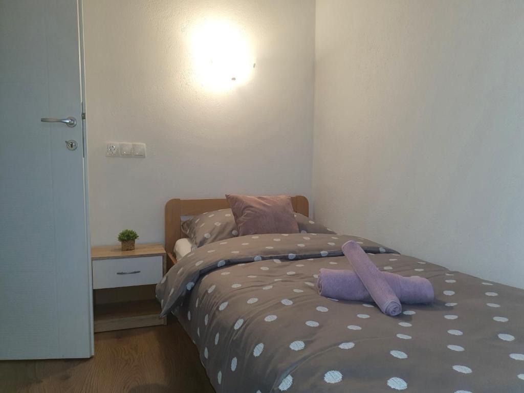 Posteľ alebo postele v izbe v ubytovaní Apartment Radoš
