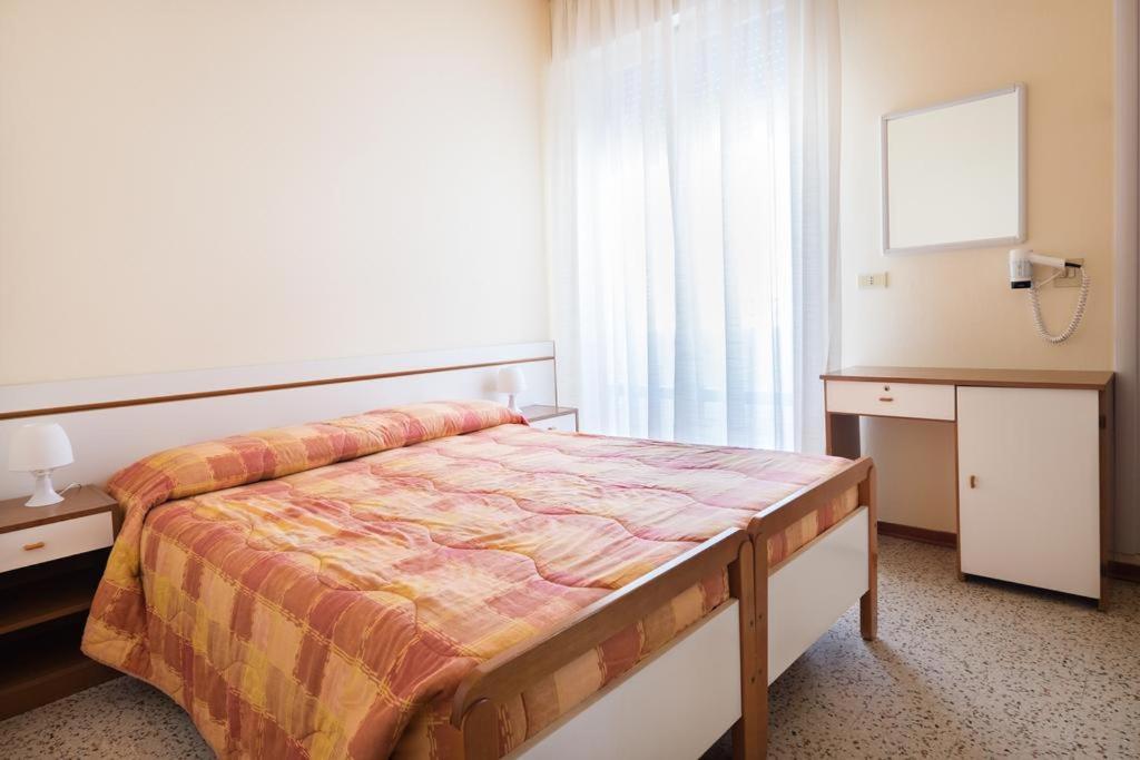 Postel nebo postele na pokoji v ubytování Hotel Continental