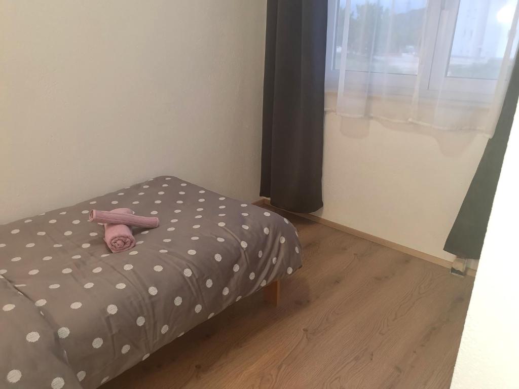 Posteľ alebo postele v izbe v ubytovaní Apartment Radoš