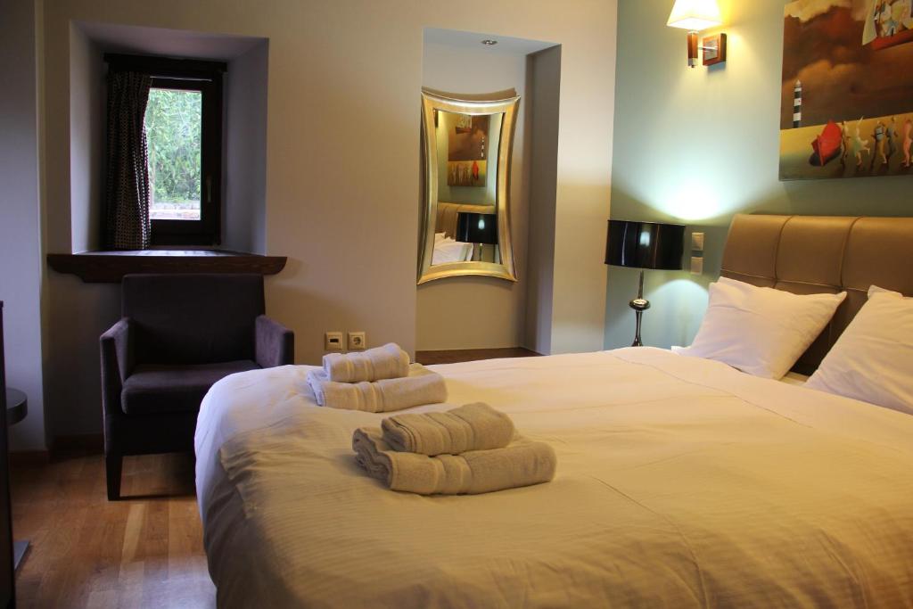 Postel nebo postele na pokoji v ubytování Tsarbou Guesthouse