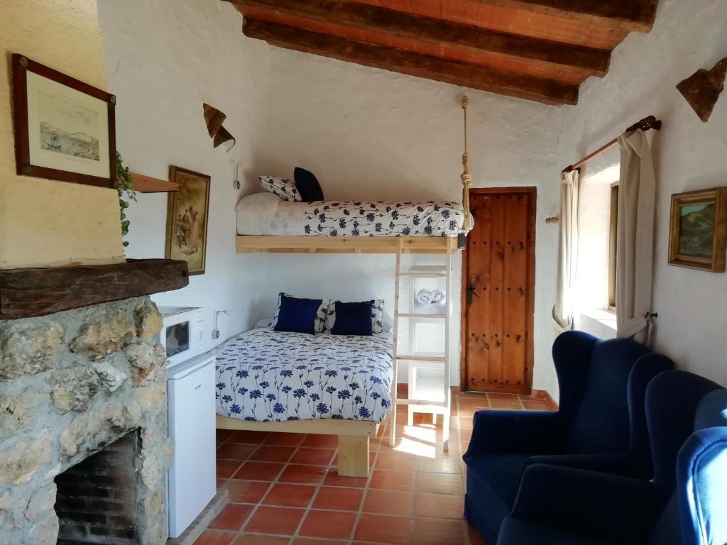Cama o camas de una habitación en Cortijo Las Monjas