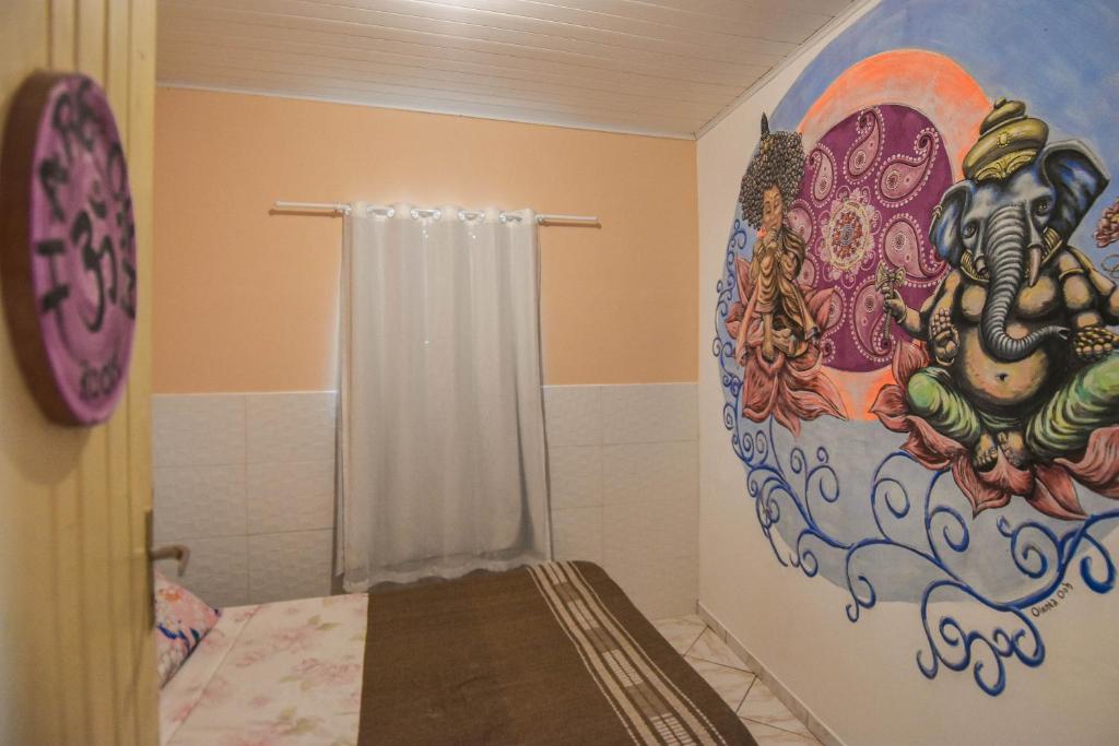 Postel nebo postele na pokoji v ubytování MANGAMEL Hostel Pousada