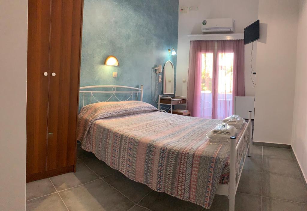 Postel nebo postele na pokoji v ubytování Villa Ilios