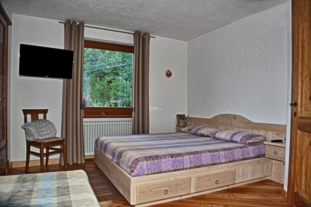 Postel nebo postele na pokoji v ubytování Lo Pallier de Ré