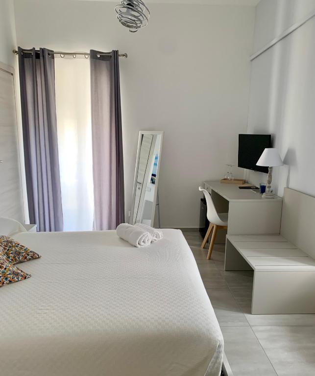 Postel nebo postele na pokoji v ubytování Il Canale Design House