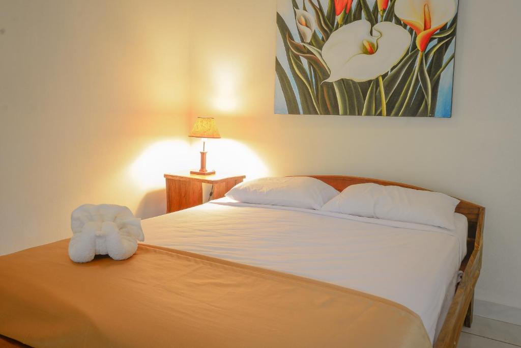 Postel nebo postele na pokoji v ubytování Hotel Cerro Lodge