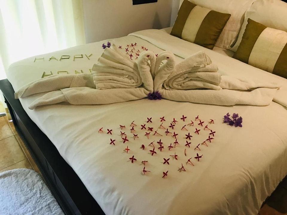 Postel nebo postele na pokoji v ubytování Hotel Grand Casa