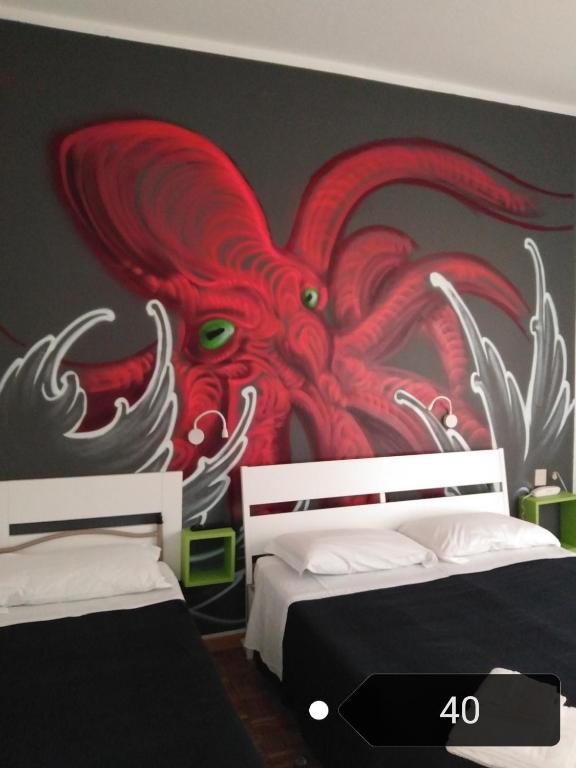 Postel nebo postele na pokoji v ubytování X Hotel