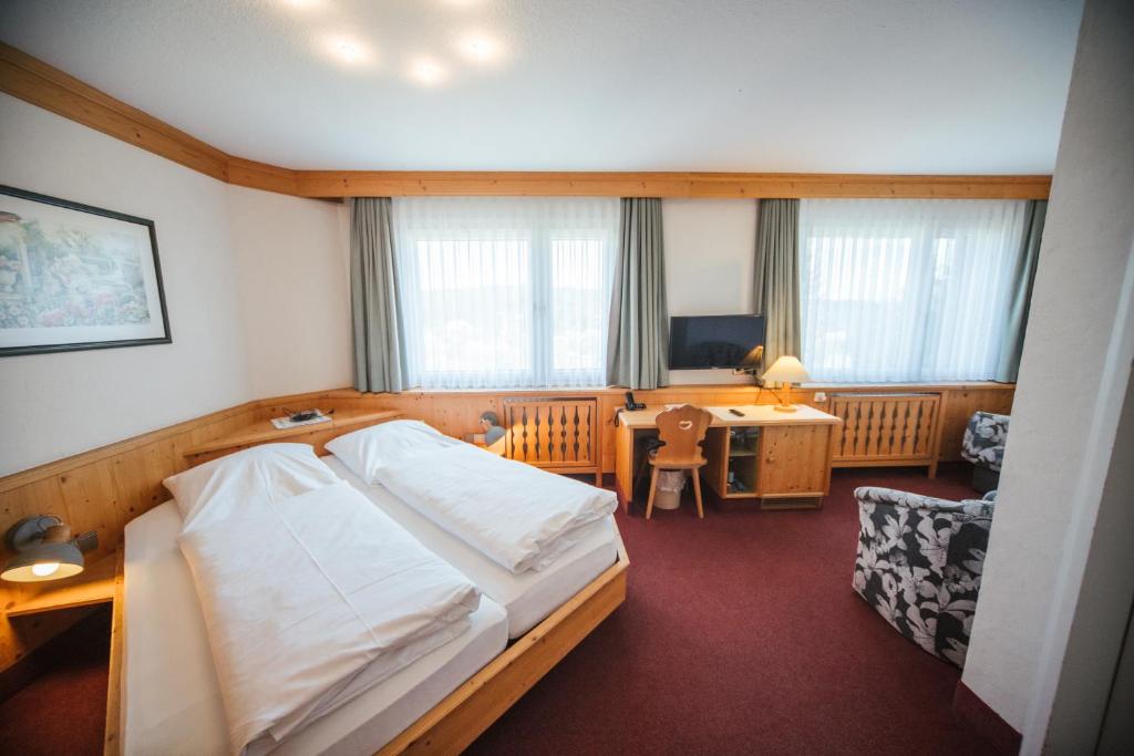 Postel nebo postele na pokoji v ubytování Hotel Waldeck mit Restaurant "Florian'S"