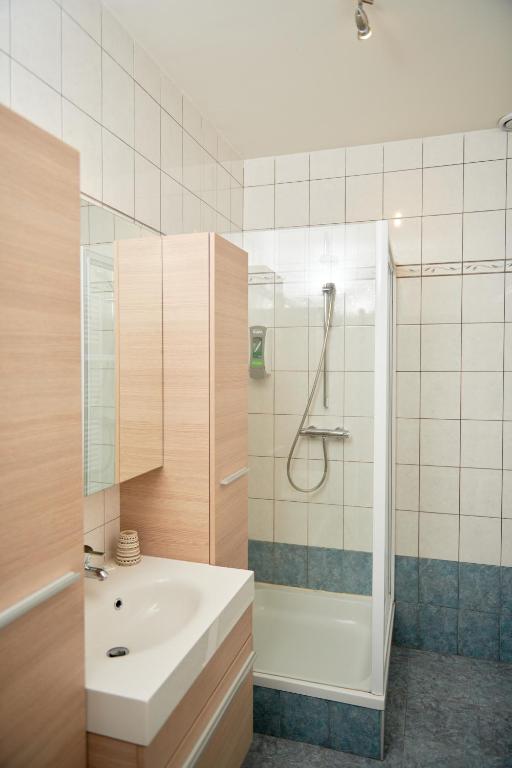 Koupelna v ubytování De Statie