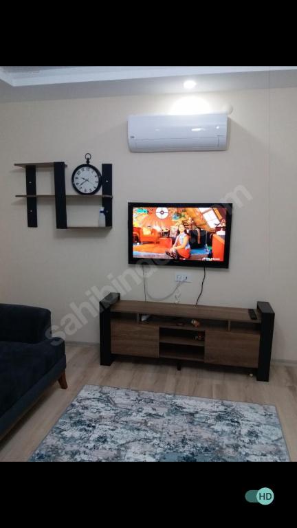 TV a/nebo společenská místnost v ubytování Çınar Residance