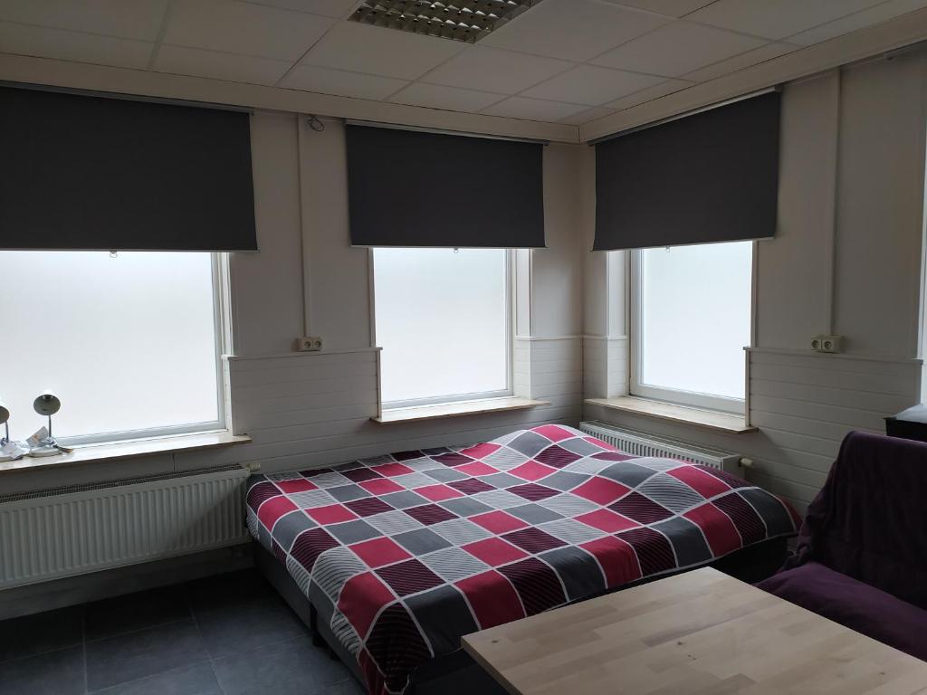 Postel nebo postele na pokoji v ubytování Casa Lommel