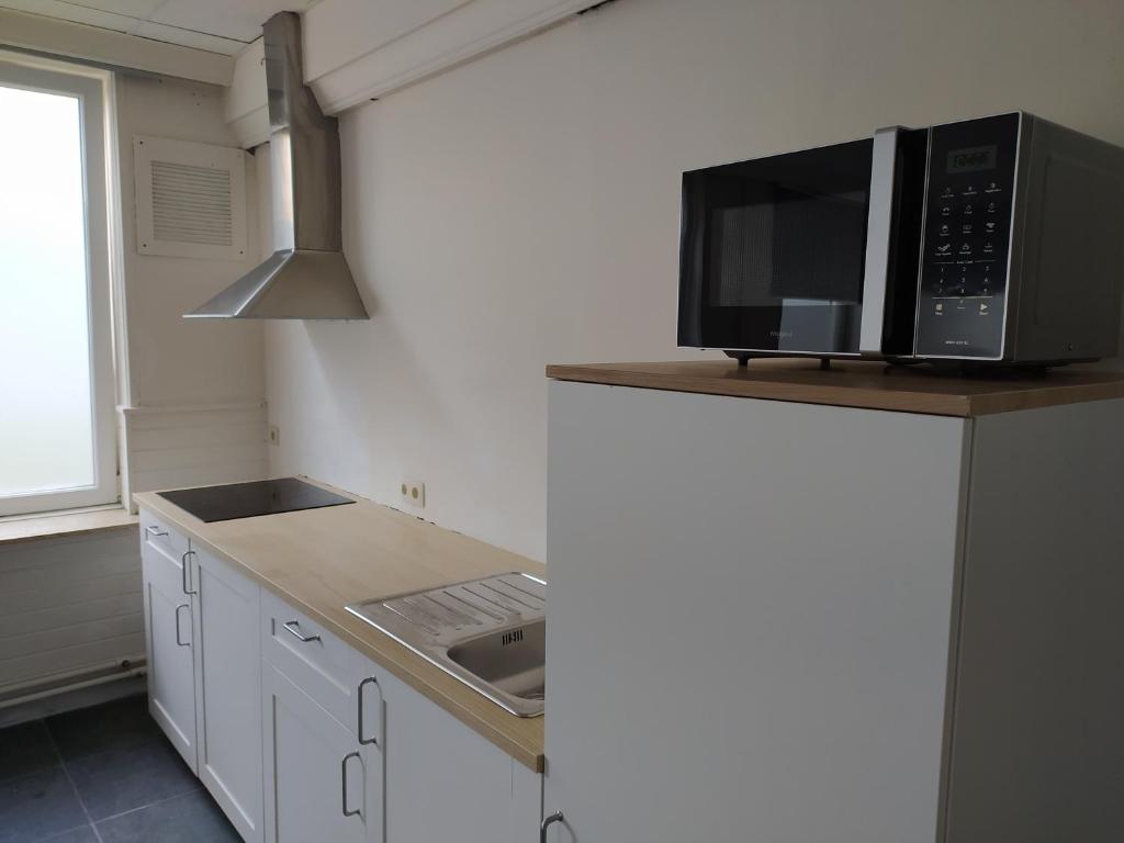 Kuchyň nebo kuchyňský kout v ubytování Casa Lommel